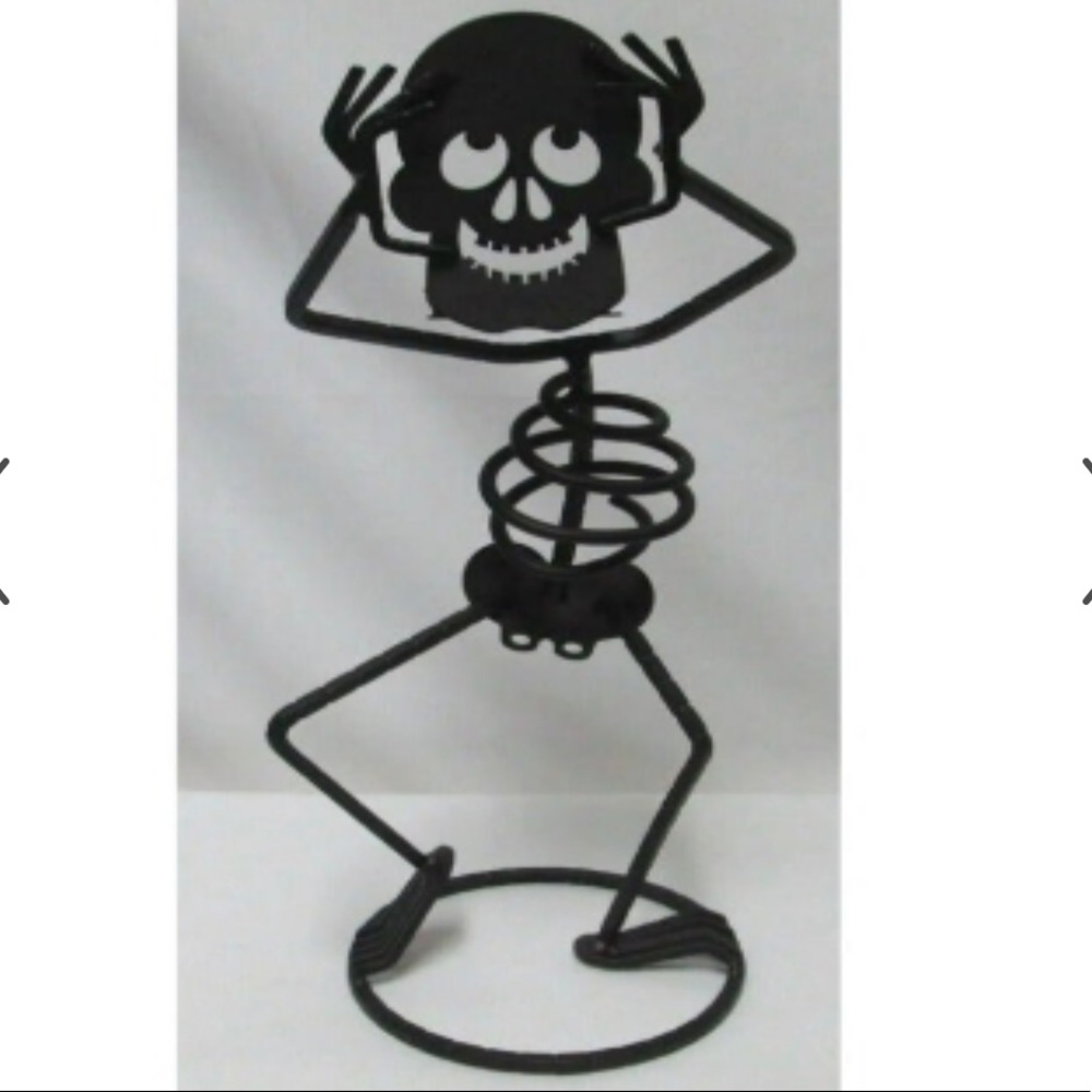 Retired Partylite skeleton NIB